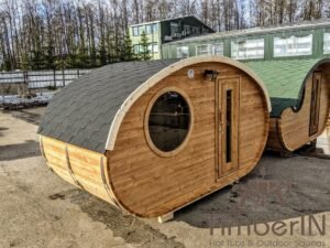 Outdoor hobbit style wooden sauna 22
