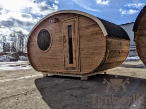 Outdoor hobbit style wooden sauna 29