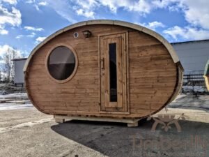 Outdoor hobbit style wooden sauna 31