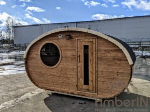 Outdoor hobbit style wooden sauna 32