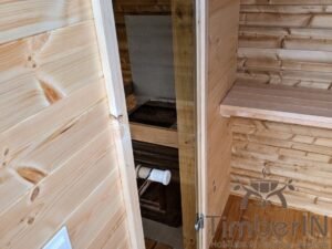 Outdoor hobbit style wooden sauna 35