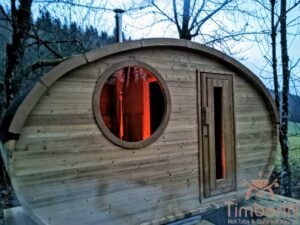 Outdoor hobbit style wooden sauna scaled