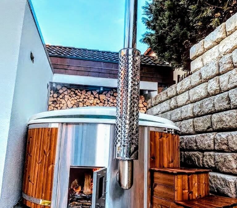 Heating the hot tub with a wood fired stove (3)